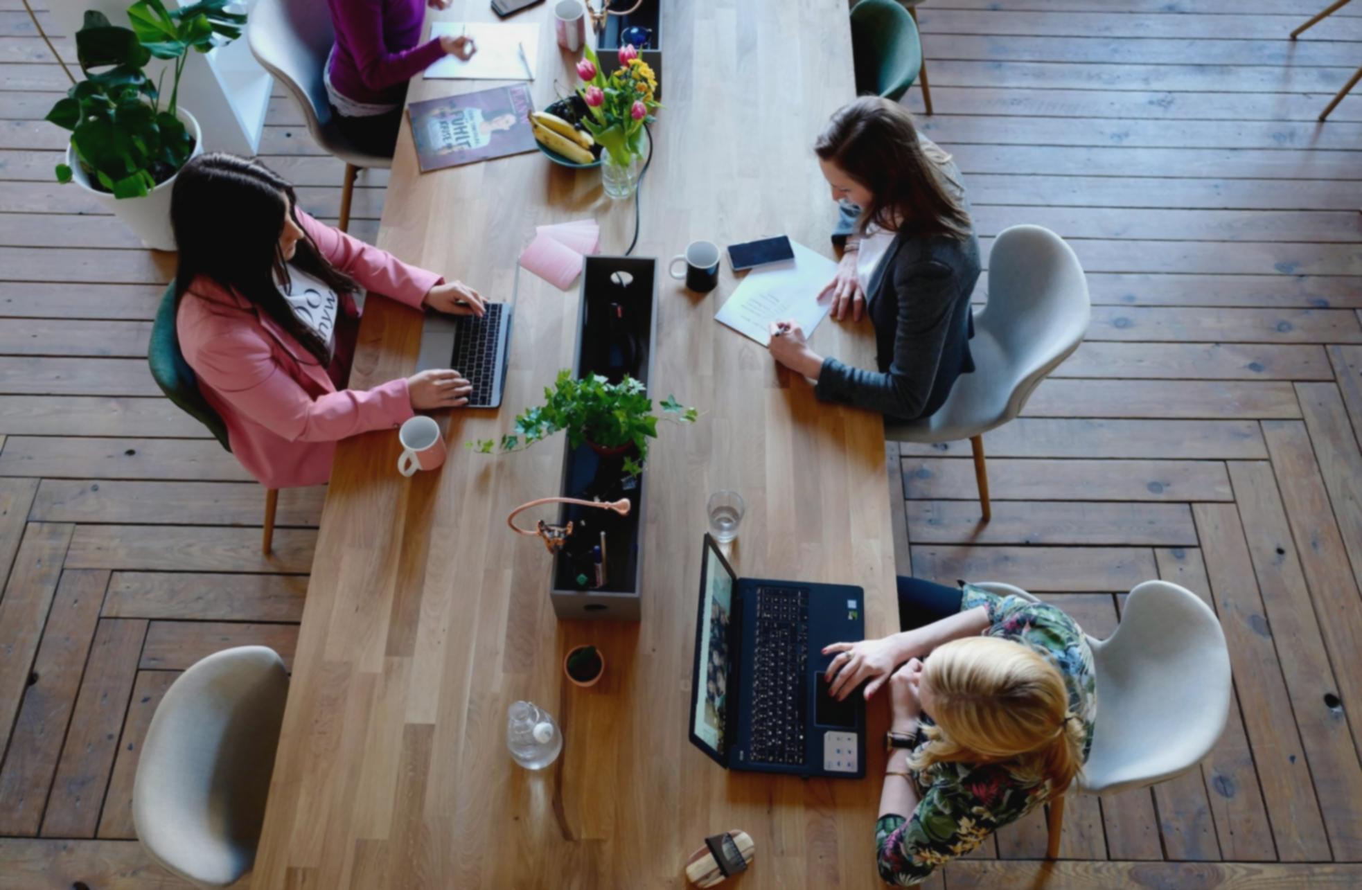 A participant working through a family budget exercise on a laptop at home